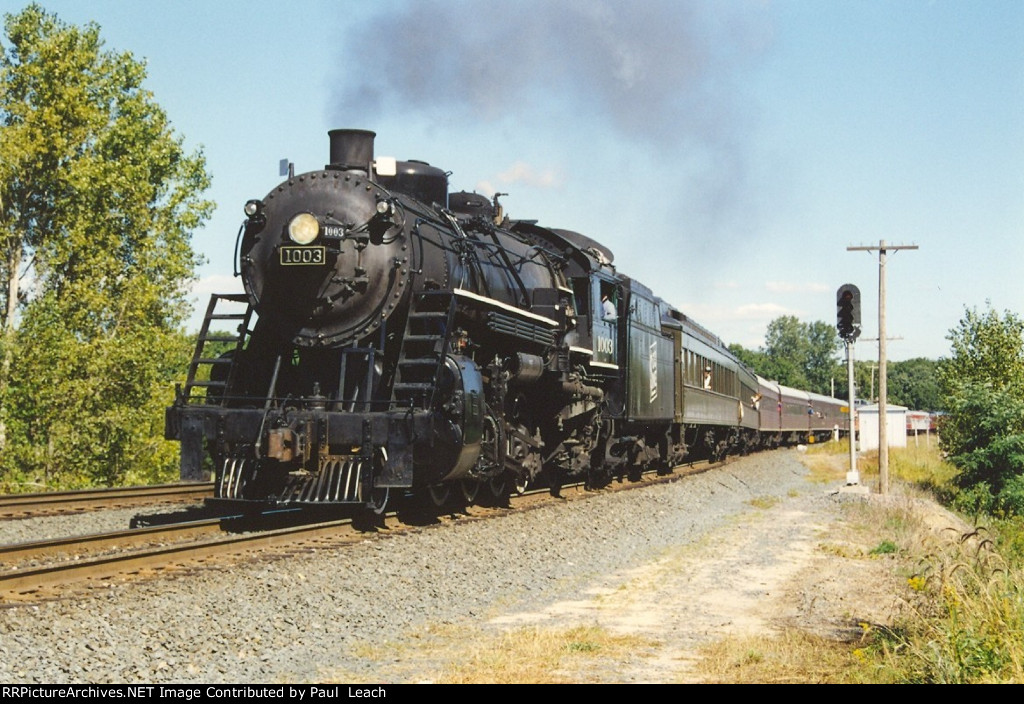 Westbound excursion eases past Cardigan Junction